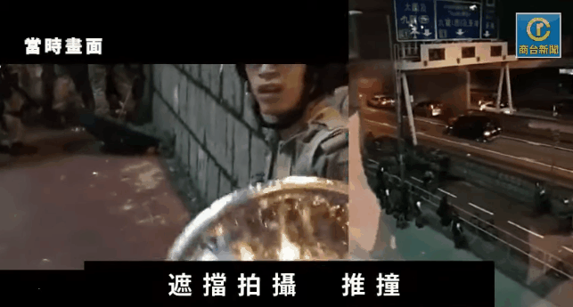 Police officers obstruct reporters from covering the protest in Sha Tin