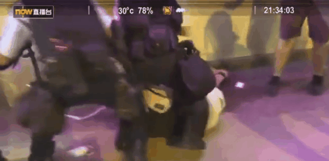 break the arm of a subdued protester