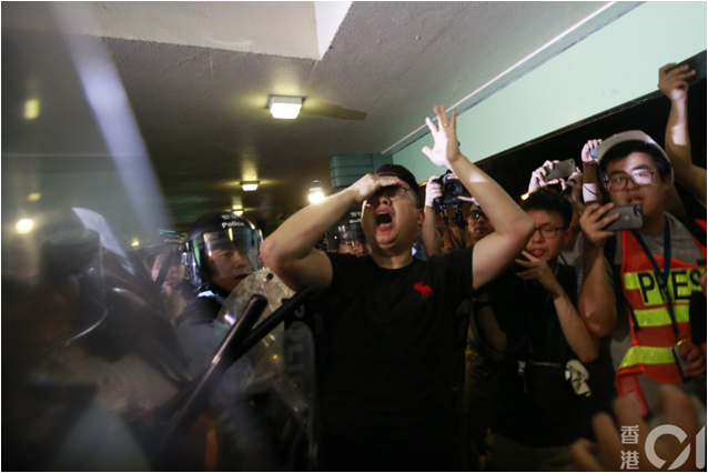 Assaults a legislative councilor with police baton