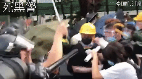 Police officers baton-charges retreating protesters without any warning