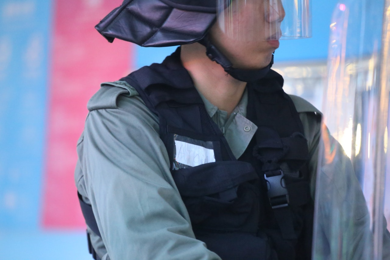 Riot police hid their Police IDs, replacing warrant cards with written papers