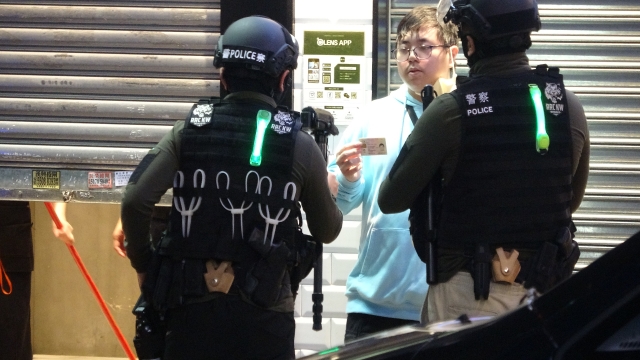 Nine months after the June 12 incident, a large number of passers-by were searched in Mongkok’s downtown area, taken head shots with their ID cards one by one and asked to read their names