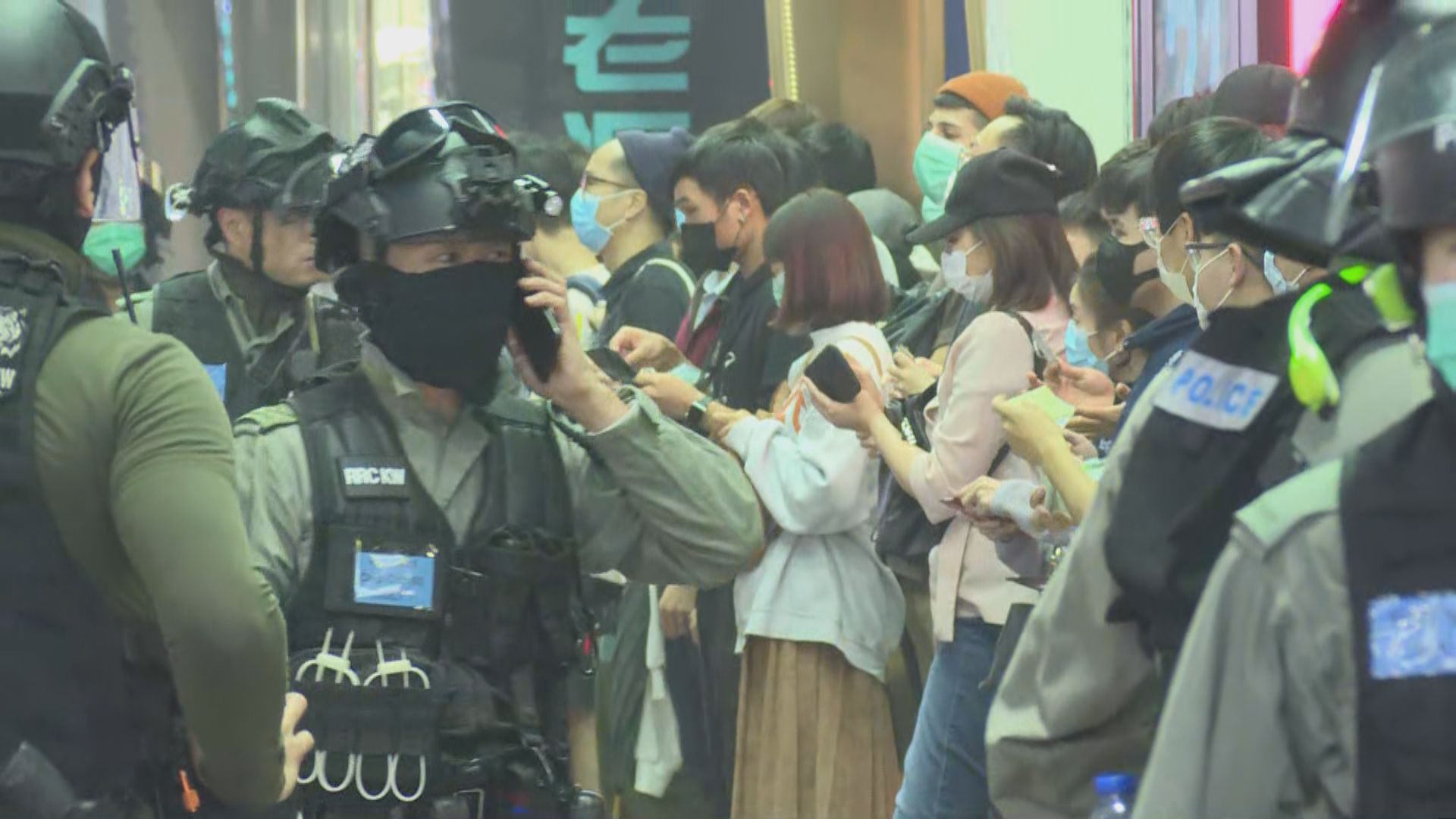 Nine months after the June 12 incident, a large number of passers-by were searched in Mongkok’s downtown area, taken head shots with their ID cards one by one and asked to read their names