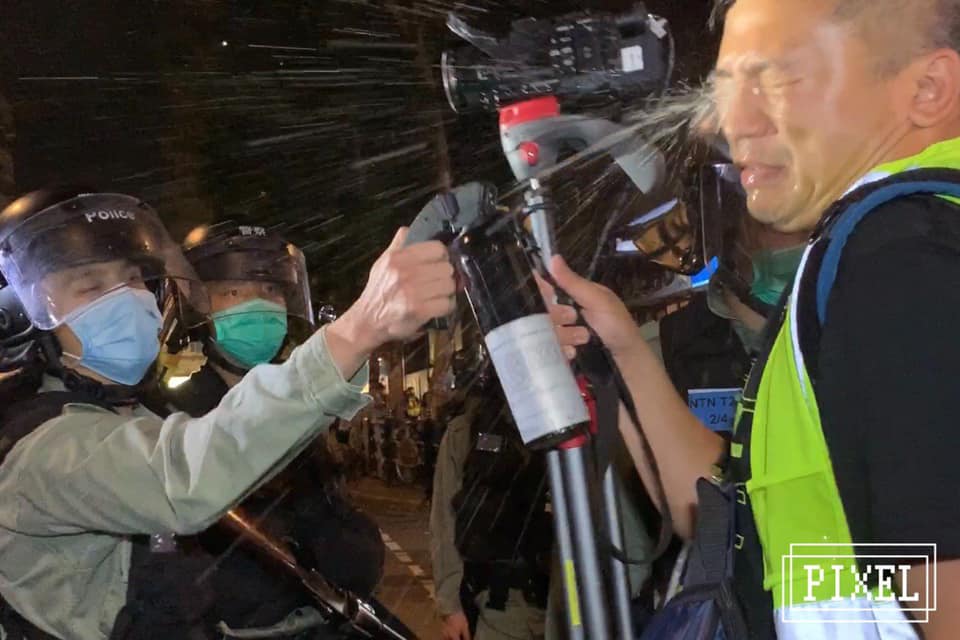 Riot Police described journalist from the Stand News as “cockroach” and intentionally pepper-sprayed him