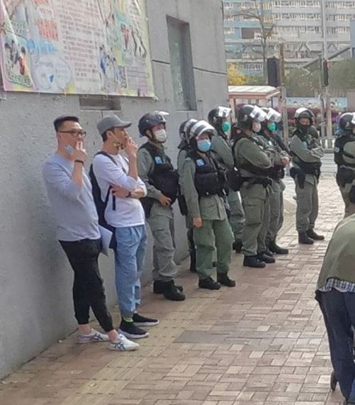 Plainclothes officers smoking while on duty.