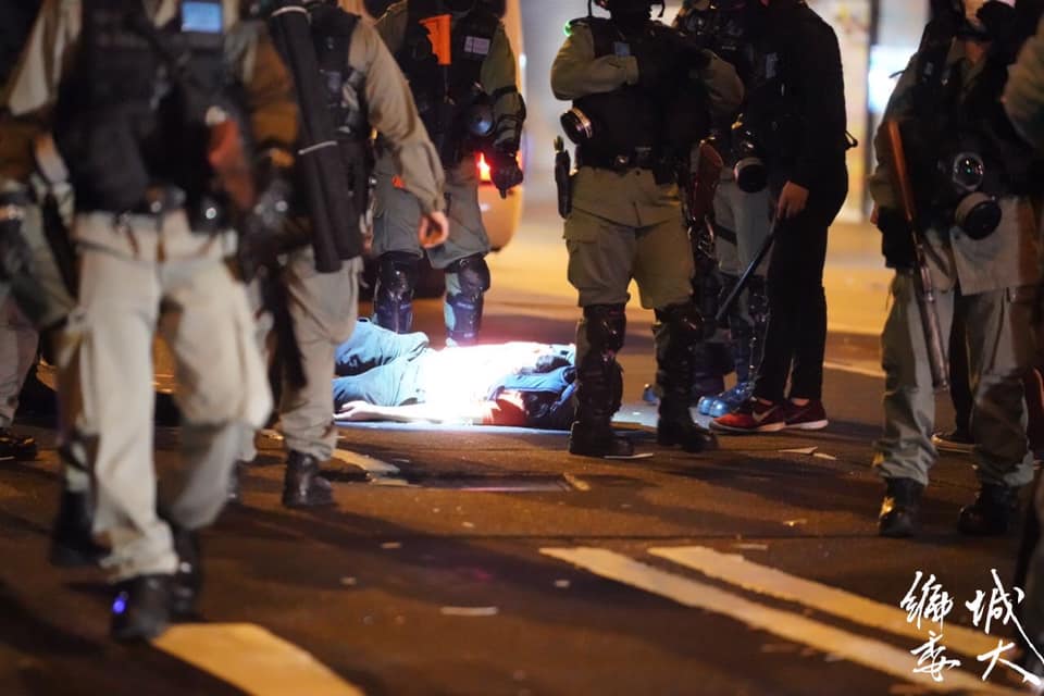 Man unconscious and dragged along for half a street after subdued by police, left to lie on ground unresponsive for 10 minutes