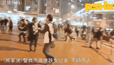 Police left without stopping after journalist knocked down with shield