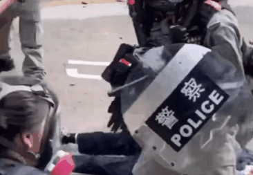 Riot police (PTU) pull elderly man to the road and pressed him to the ground