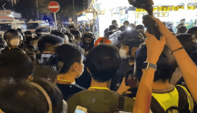 riot police pepper sprayed civilians who asked for help and the press beside the Force Media Liaison Cadre