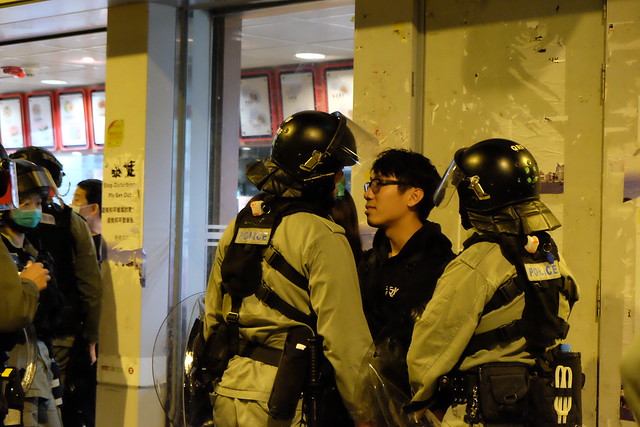 Yuen Long District Council Chairman arrested for obstructing police officers, before receiving a olute discharge.