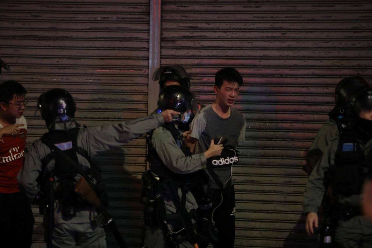 20190921 Tuen Mun district councillor, who got pepper sprayed on the pavement and scolded Riot Police (PTU), was arrested and dragged down to the road