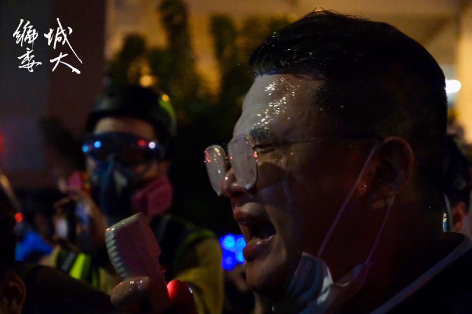 Legislative Council members called on police to remain calm, but got shot in the face by police with pepper spray
