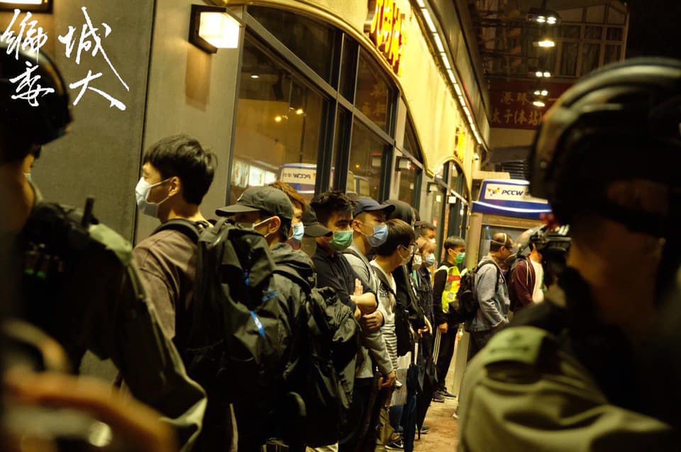 Riot Police Ordered Pedestrians Who Don’t Know Each Other to Stand Side by Side, Searched Them and then Fined them for Violating Public Gathering Ban