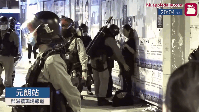 Male riot police stop and search 2 women for photographing, and once touching her buttocks