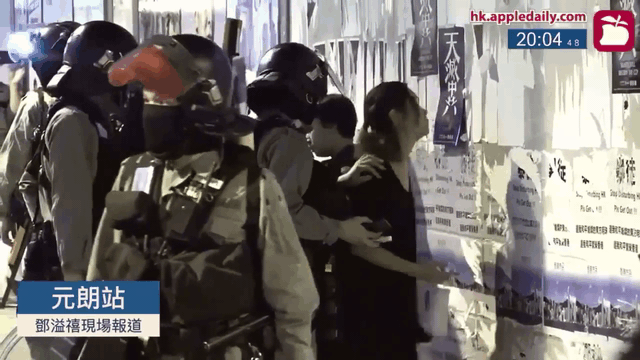 Male riot police stop and search 2 women for photographing, and once touching her buttocks