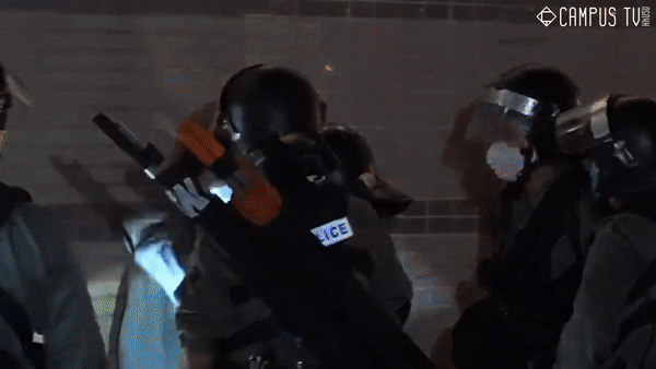 Police Shine High Intensity Flashlight at the Eyes of Civilian from a Metre