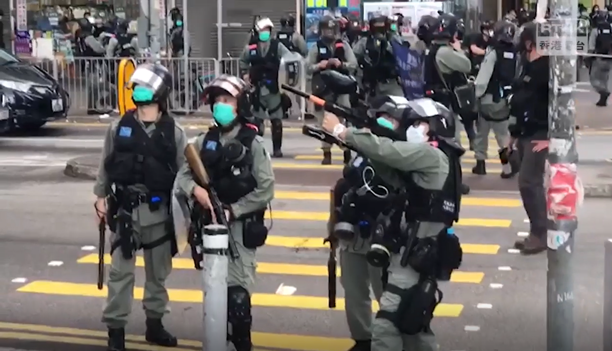 Riot police (PTU) enter Fortune Plaza Arcade in Tai Po without search warrant and point paintball gun at podium