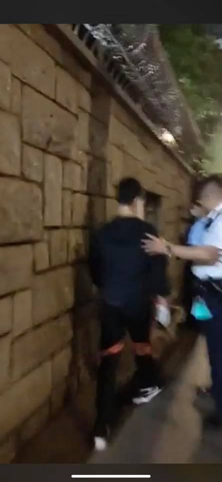 “Blue ribbon fanatics” was caught illegally hanging a banner to smear a District Councillor, attacked and fled to the police station