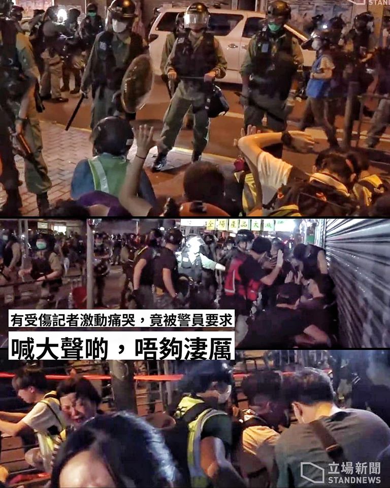 Large number of reporters surrounded by riot police, who ordered them to kneel, and swept them with pepper spray. Photograph was forbidden.